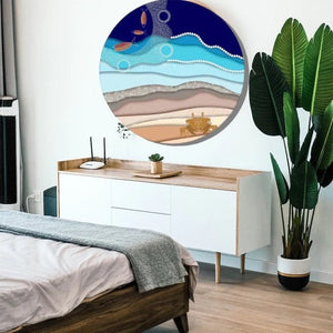 Round metal Indigenous artwork