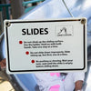 prevent injury when playing on slide outdoor sign