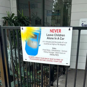 reminder sign not to leave children in cars unattended