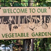 wooden welcome sign for vegetable garden